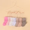 Doudou et Compagnie Semainier de chaussettes bébé - Cadeau naissance bébé fille - 0/6 mois> Chaussons